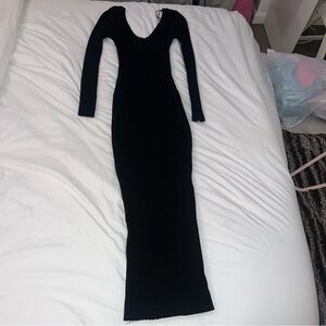 Black Bodycon sweater midi dress.